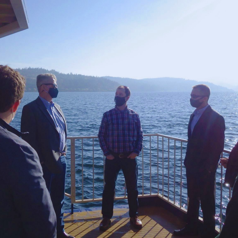 Govenor Little and DEQ Director Byrne in a boat on the Coeur d'Alene Lake.